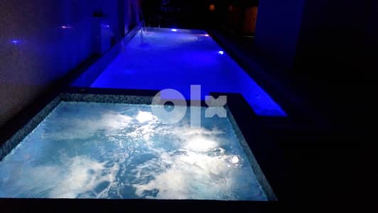 Style furnished 2 bedroom in mangaf with Sea view & pool. 0